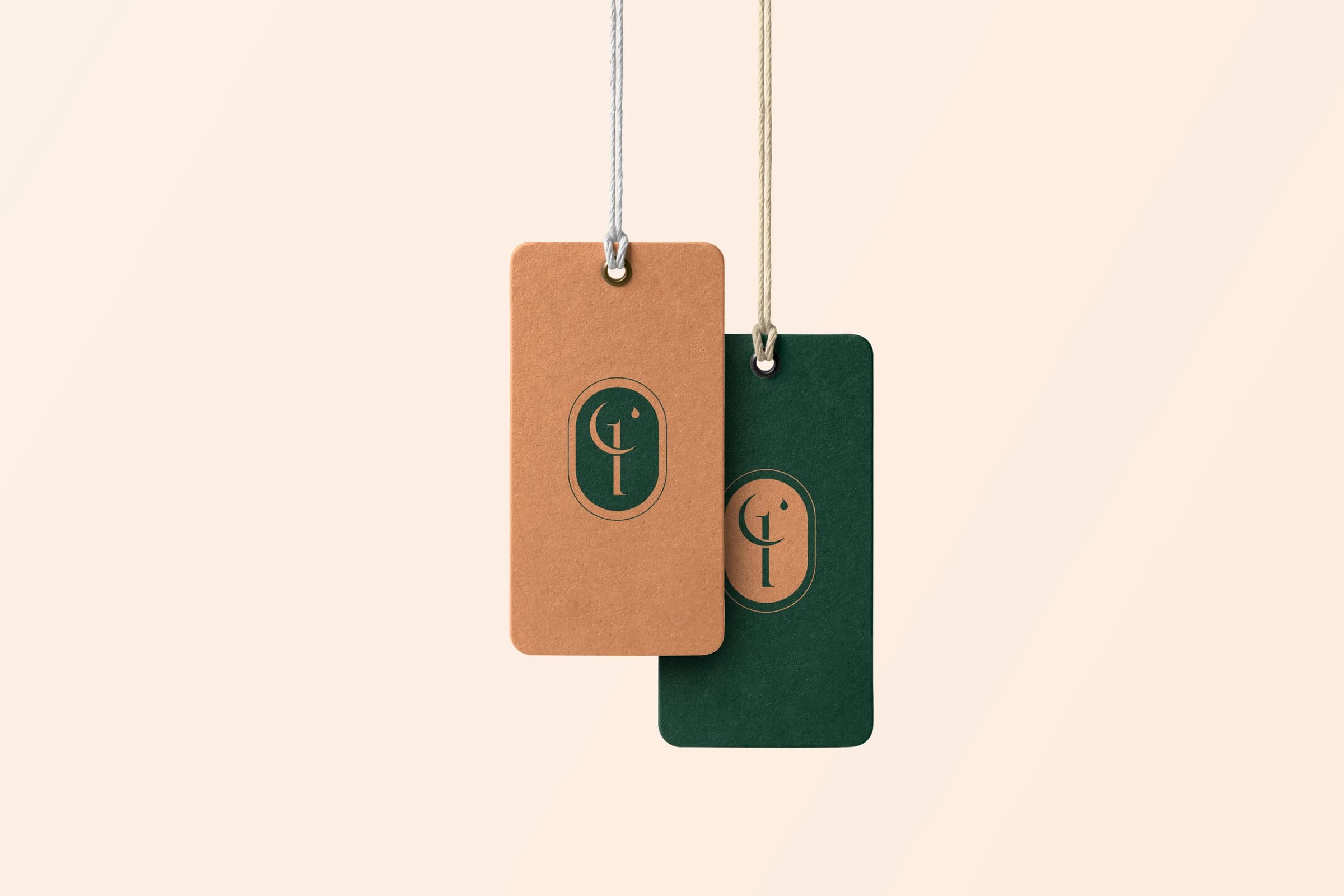 Orange and green Clotho Liners hang tags